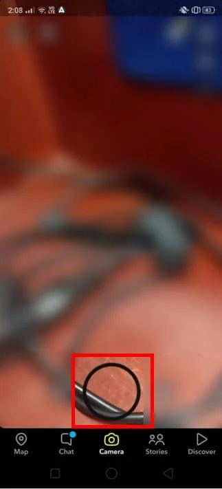 画面の中央下に黒い円が表示されます