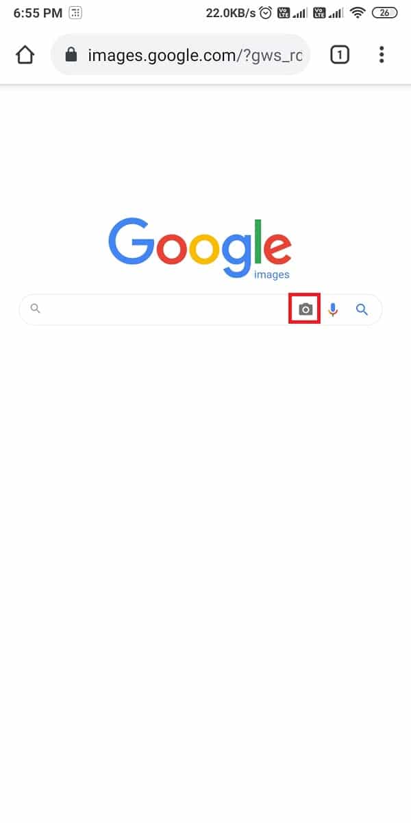 Appuyez sur l'icône Appareil photo à côté de la barre de recherche.