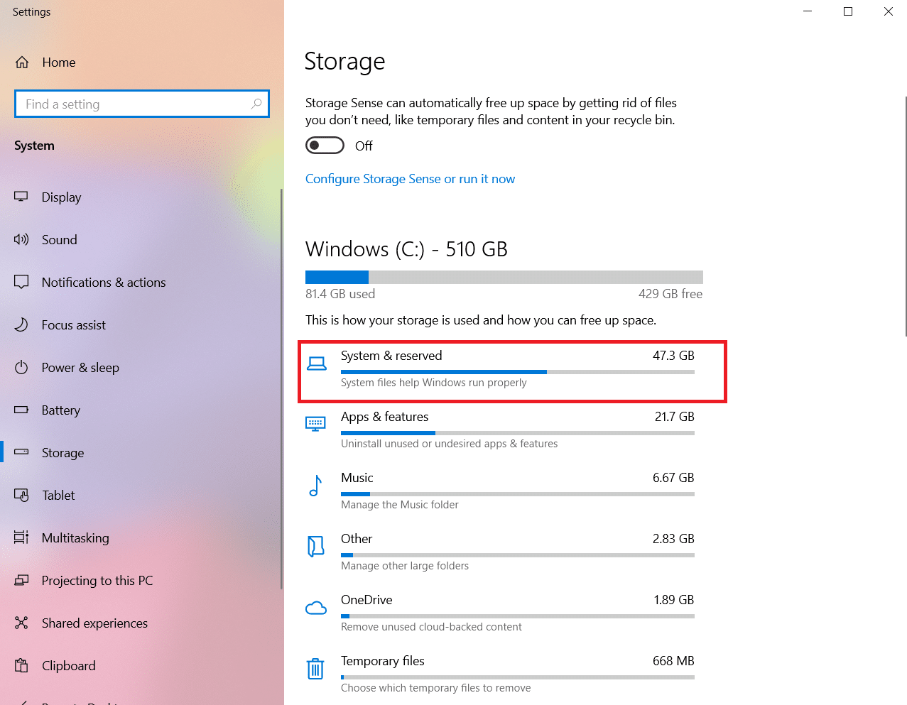 Fare clic su Sistema e riservato in Impostazioni di archiviazione. Come eliminare i file di installazione di Win in Windows 10