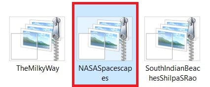 ダウンロードしたファイルをダブルクリックして、テーマをデスクトップに適用します。