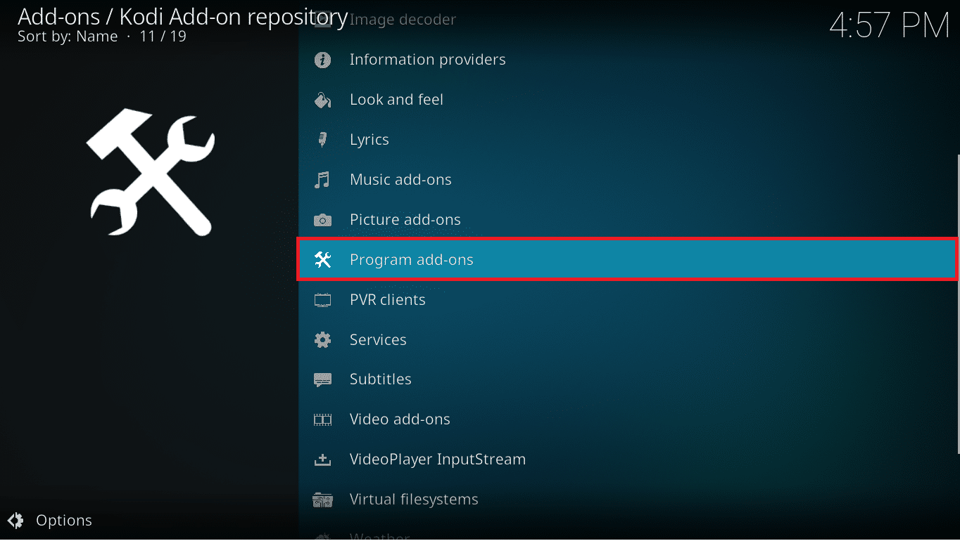 Pilih opsi Add-on Program dari menu. Cara Memperbarui Perpustakaan Kodi