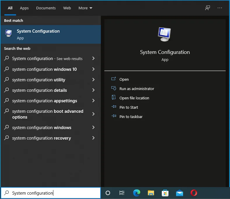 Escriba Configuración del sistema y seleccione el primer resultado.