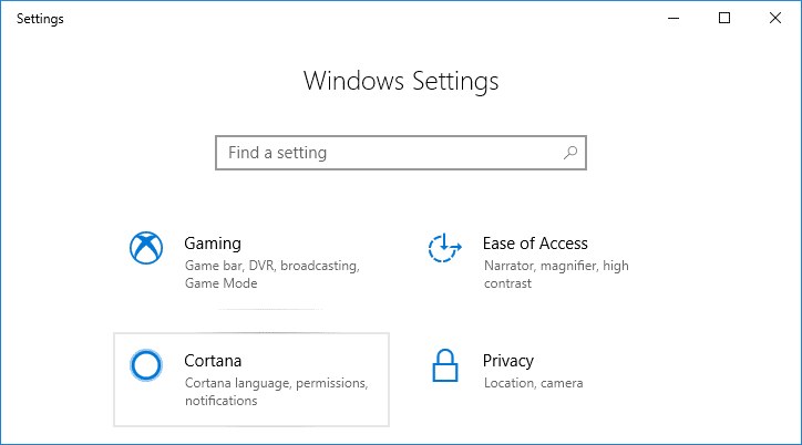 按 Windows 键 + I 打开设置，然后单击 Cortana 图标