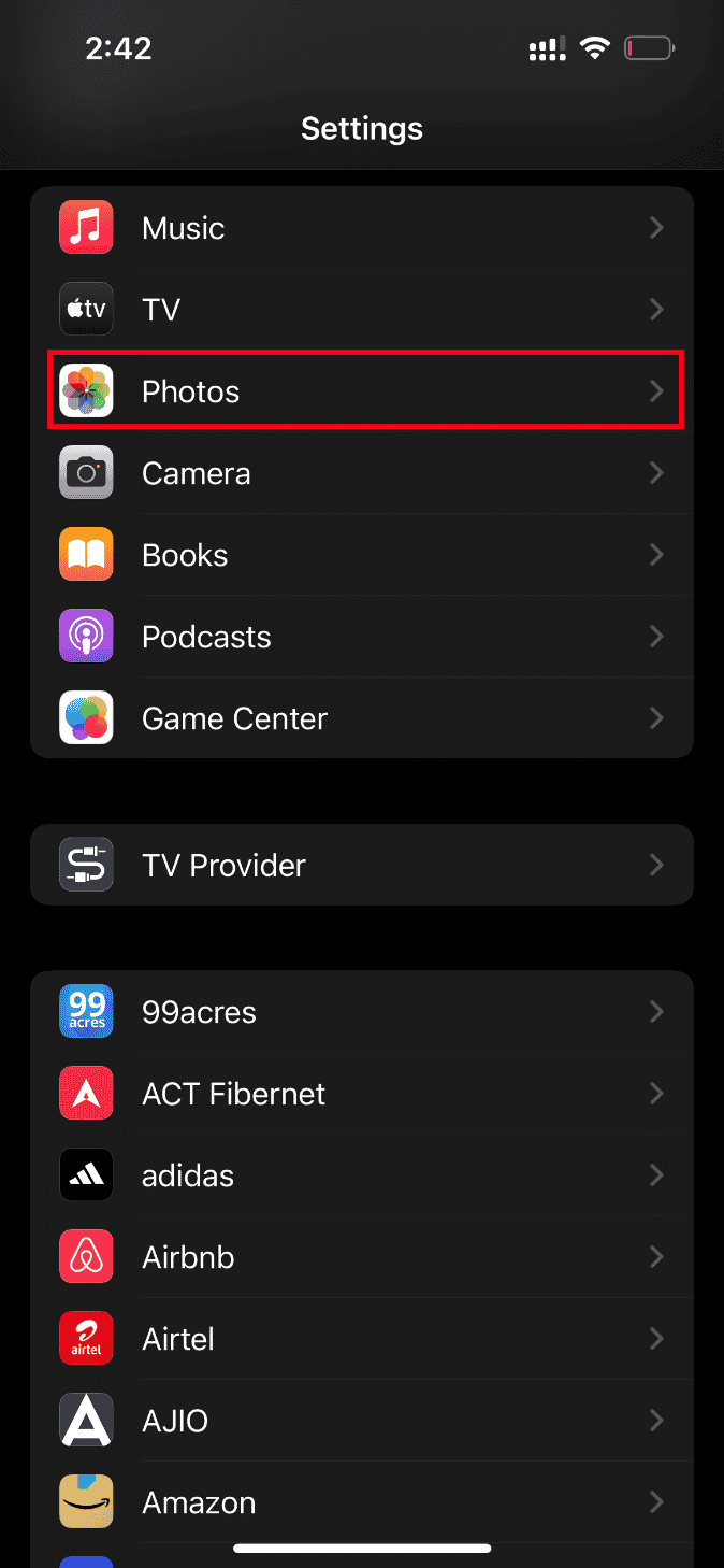 Toque em Configurações de fotos. Corrigir um erro ao carregar uma versão de alta qualidade desta foto no iPhone
