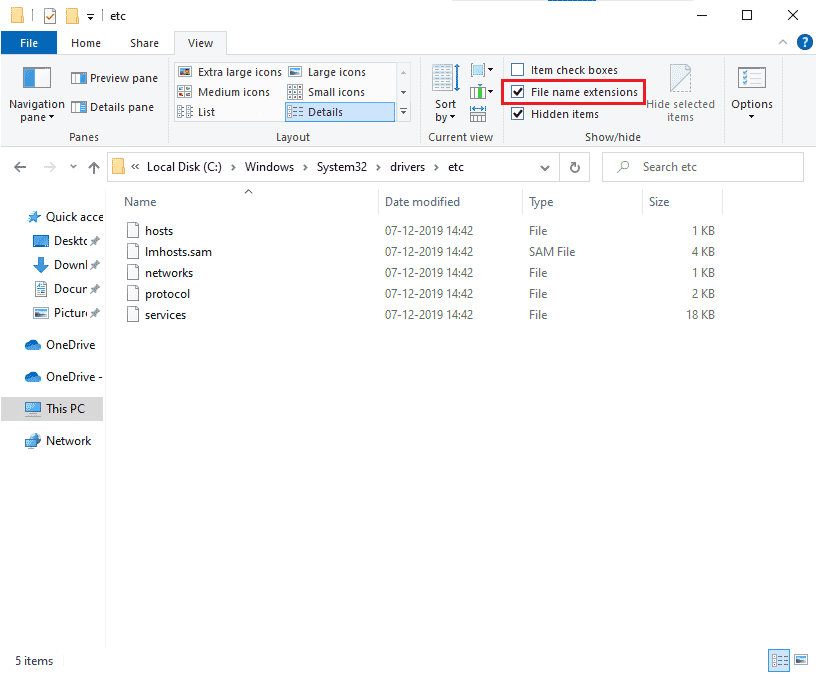 klik pada kotak Ekstensi nama file di bawah tab Lihat
