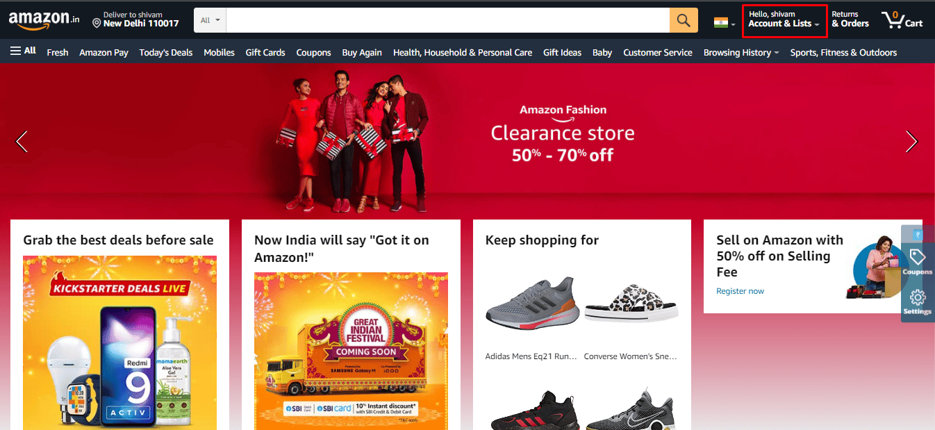 Pastikan Anda masuk ke akun Amazon Anda, lalu klik opsi Akun & Daftar di kanan atas layar Anda.