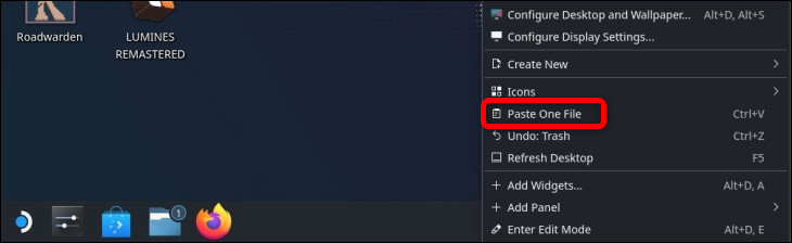 قم بلصق أداة تثبيت EmuDeck على سطح المكتب بالنقر بزر الماوس الأيمن فوقه ثم النقر فوق الزر لصق ملف واحد